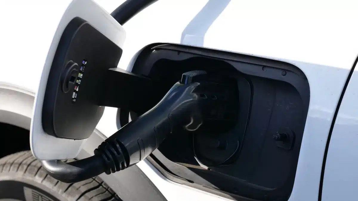 Charging cable connected to an electric vehicle charge port