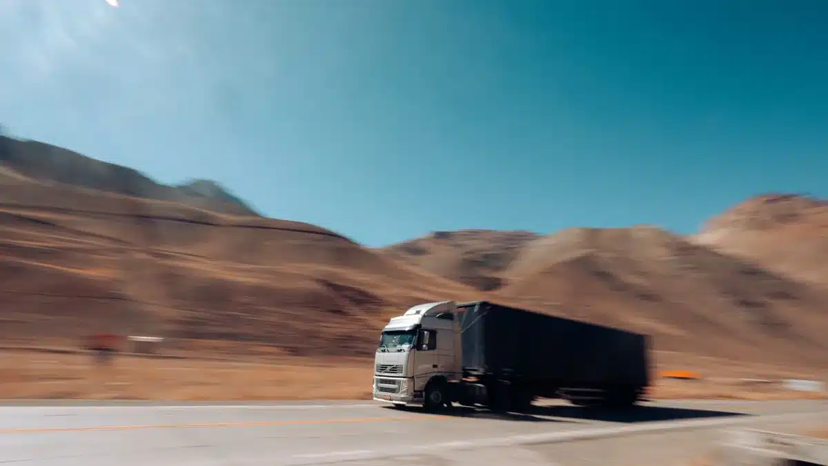 Freight truck moving at speed on an open highway