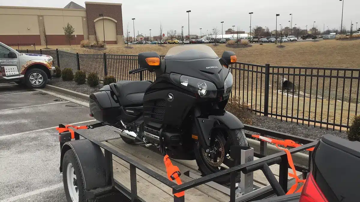 Touring motorcycle secured on a transport trailer