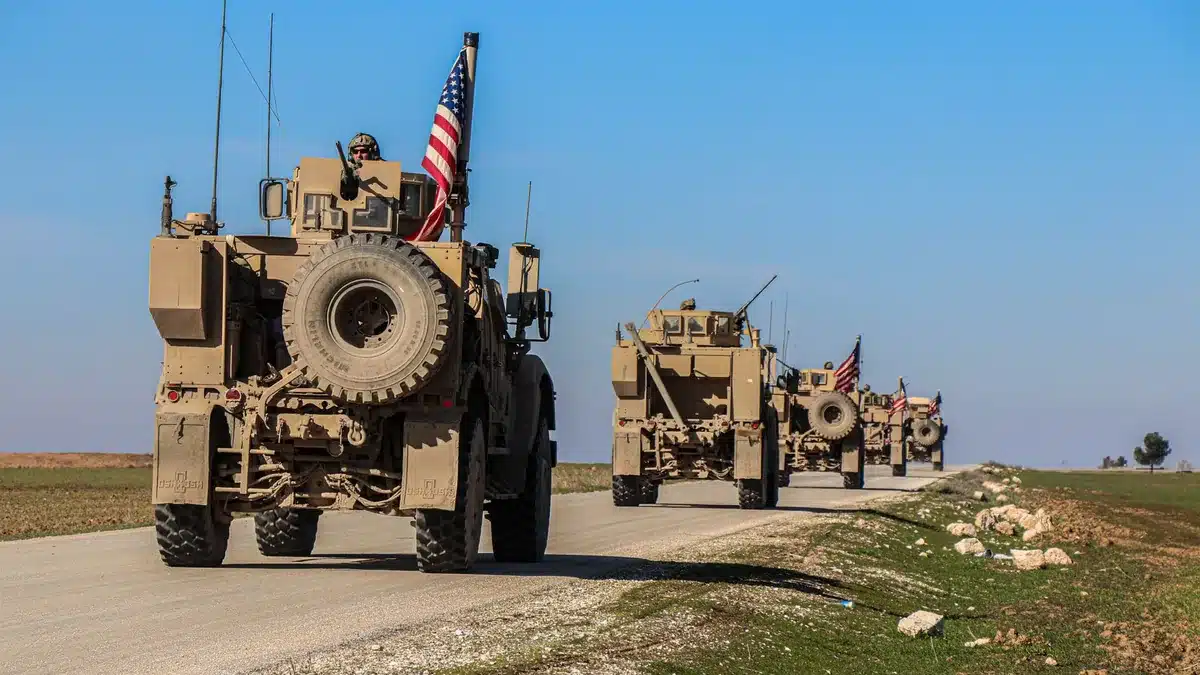 United States military vehicle convoy on a transport route